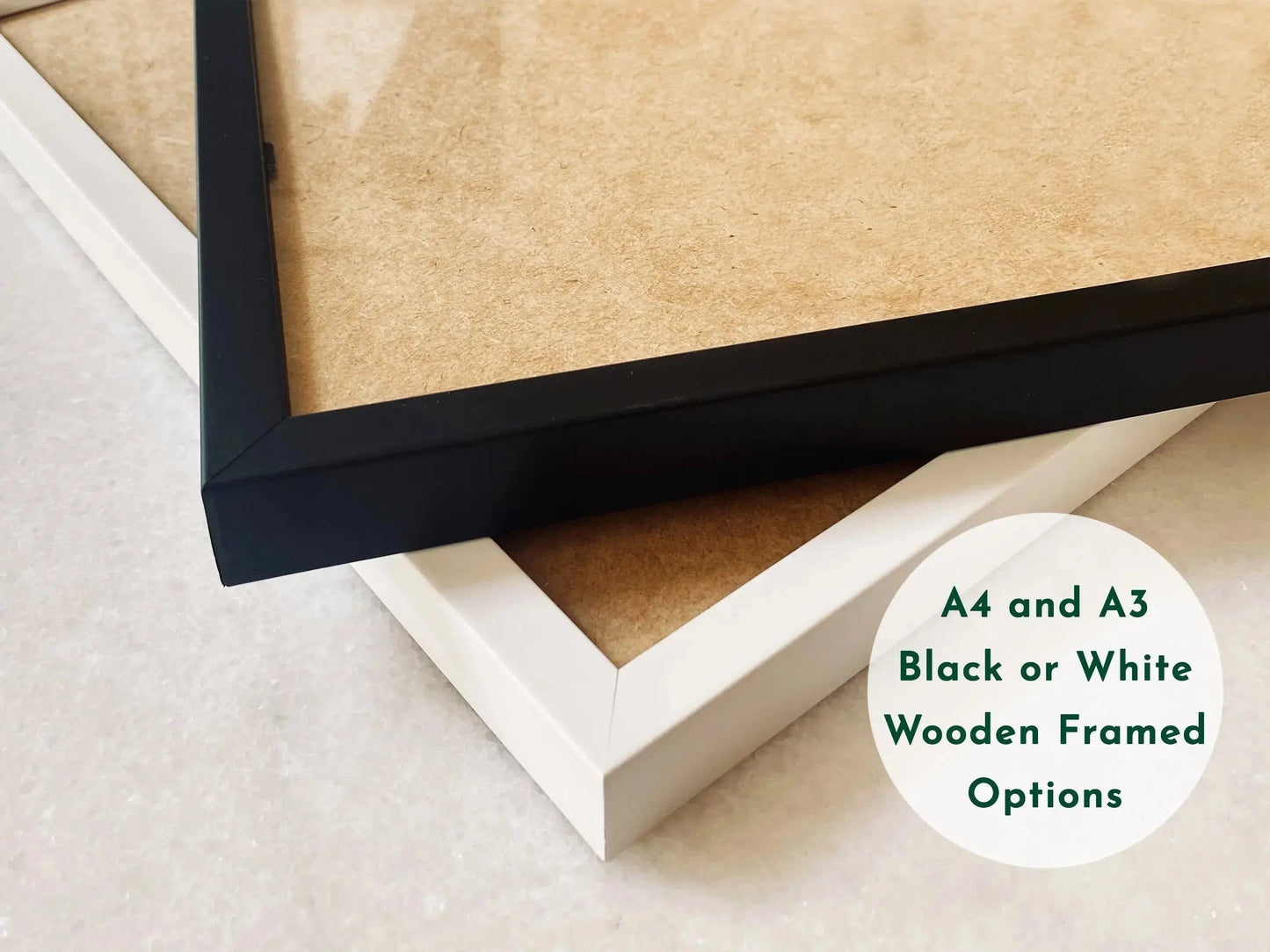 Close-up image showcasing black and white wooden frame options for prints, displayed on a light surface. Text overlay reads: A4 and A3 Black or White Wooden Framed Options