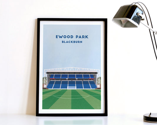 A modern style Blackburn Rovers Print, featuring a contemporary illustration of their home stadium the Ewood Park in Blackburn, displayed within a black frame.