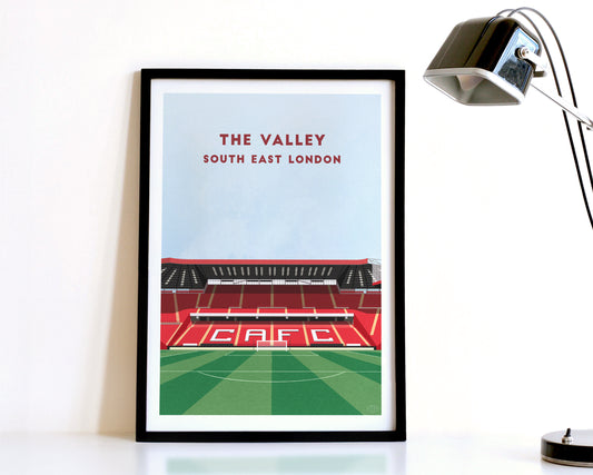 A modern style Charlton Athletic Print, featuring a contemporary illustration of their home stadium The Valley in South East London, displayed within a black frame.