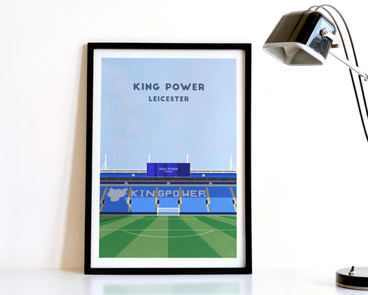 A modern style Leicester City Print, featuring a contemporary illustration of their home stadium the King Power Stadium in Leicester, displayed within a black frame.