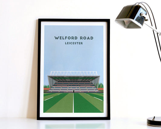 A modern style Leicester Tigers Print, featuring a contemporary illustration of their home stadium the Welford Road in Leicester, displayed within a black frame.