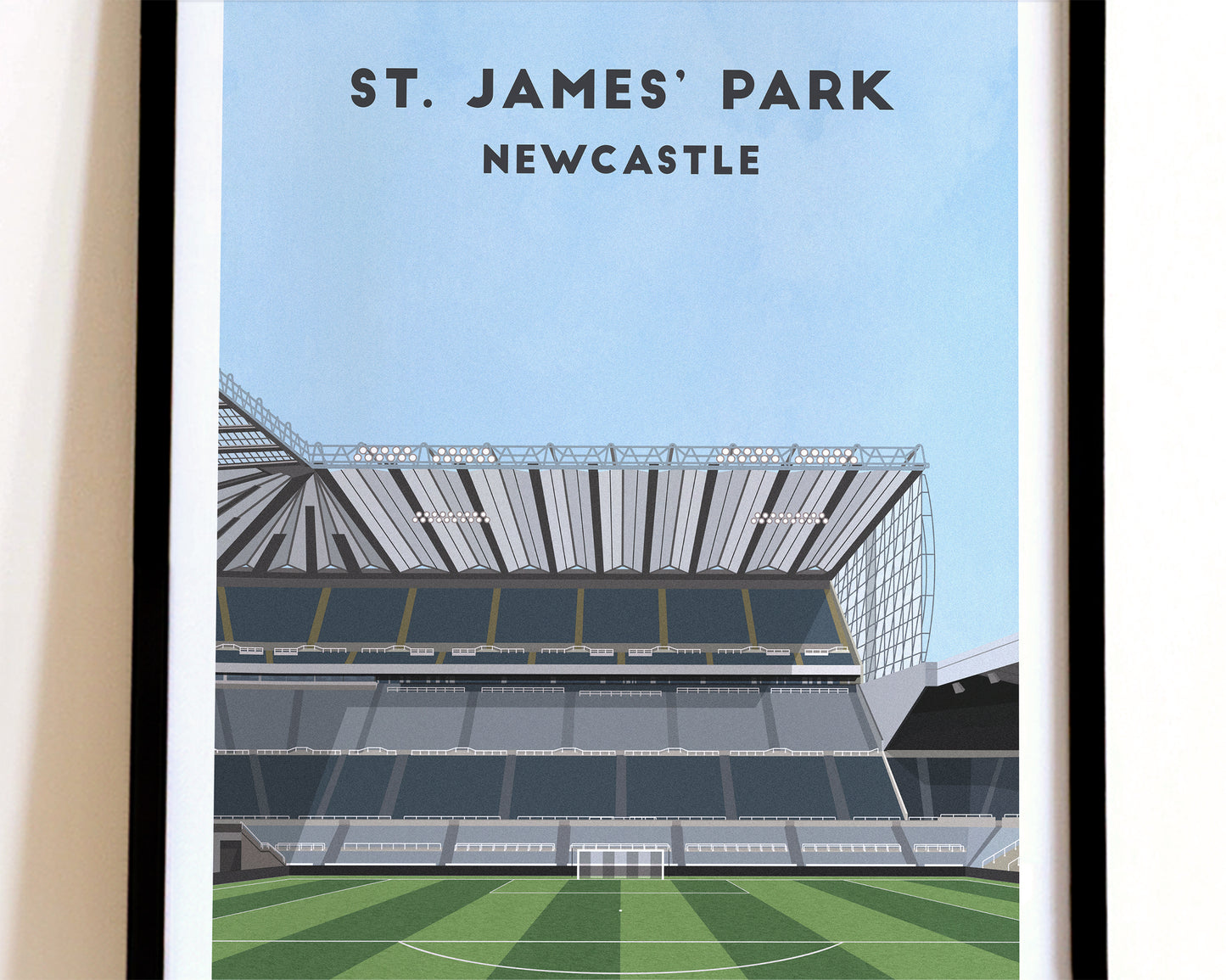 A modern style Newcastle United Print, featuring a contemporary illustration of their home stadium the St. James' Park in Newcastle, displayed within a black frame.