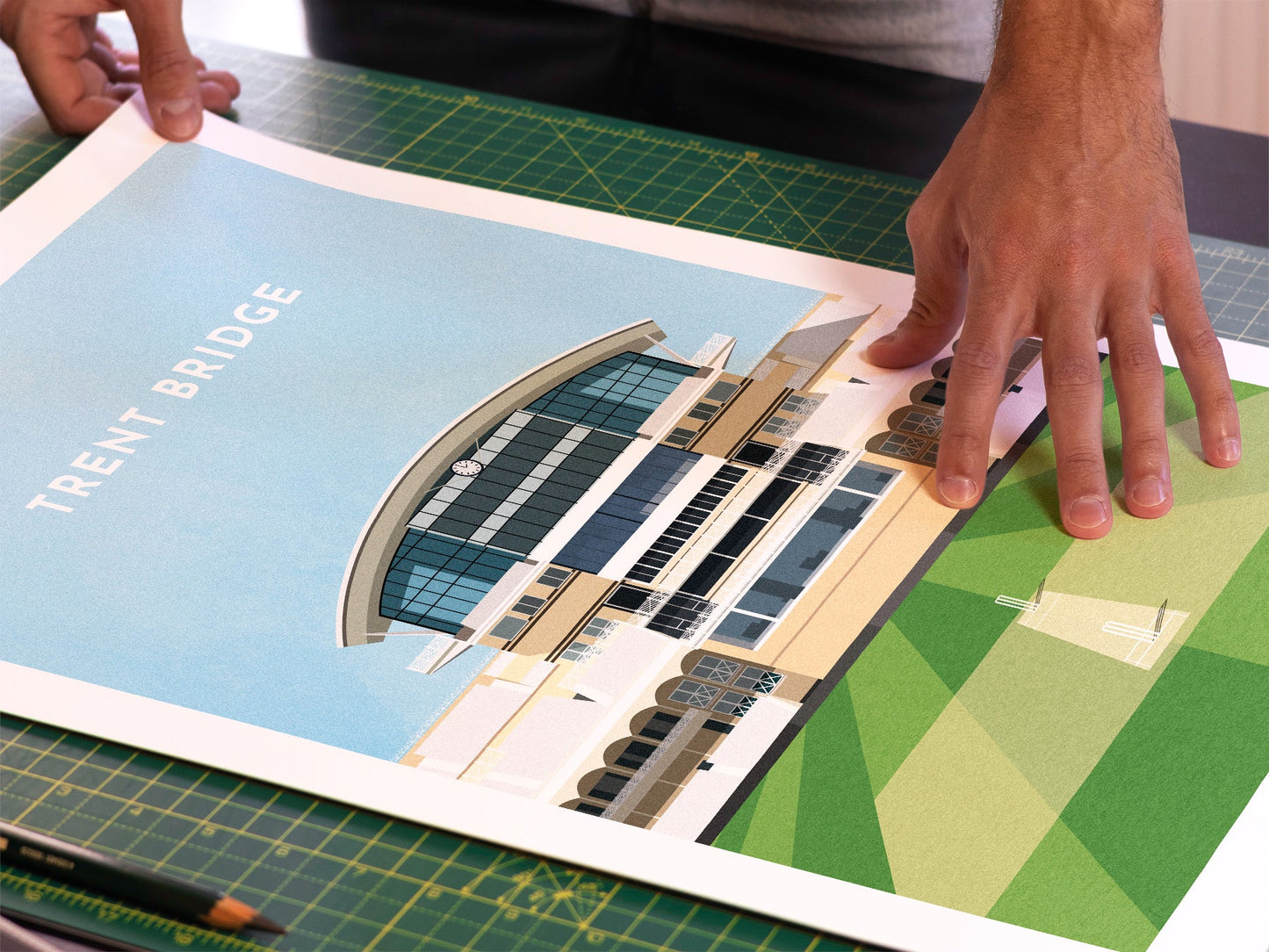 A photo in our printing studio, of one of our illustrated art prints of Trent Bridge after it has been printed and is about to be packaged.