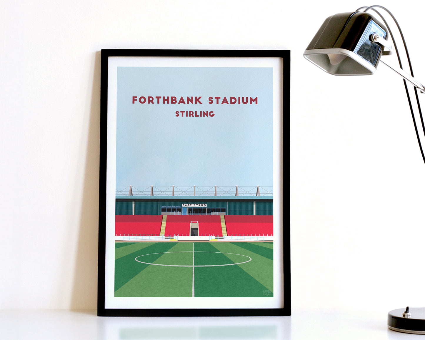 A modern style Stirling Albion Print, featuring a contemporary illustration of their home stadium the Forthbank Stadium in Stirling, displayed within a black frame.