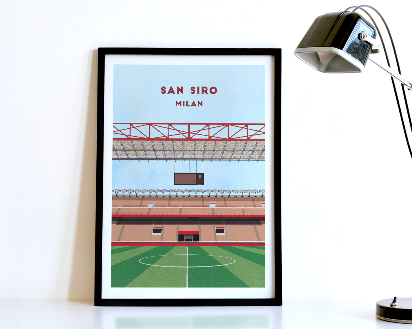 A modern style Milan Print, featuring a contemporary illustration of their home stadium the San Siro in Milan, displayed within a black frame.