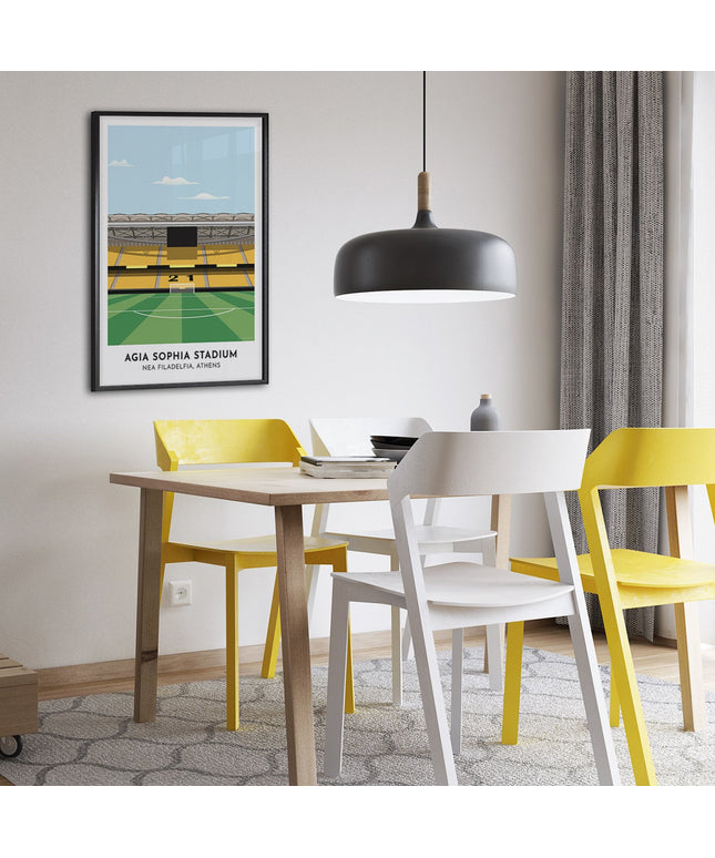 Framed illustrated print of Agia Sophia Stadium in Nea Filadelfia, Athens, home to AEK Athens, showcasing a minimalist design with vibrant black and yellow stands, green football pitch, under a blue sky.