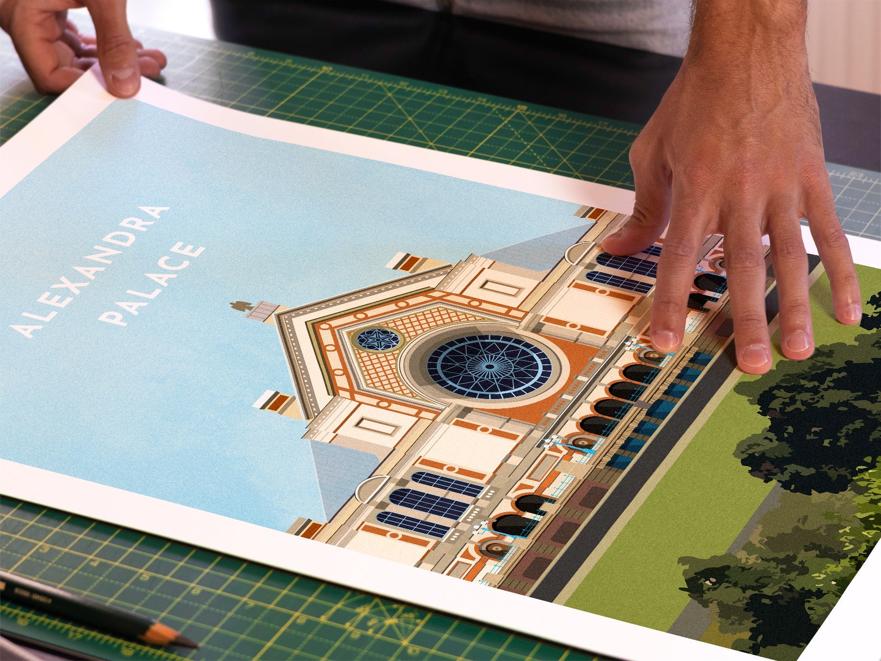 A photo in our printing studio, of one of our illustrated art prints of the Alexandra Palace after it has been printed and is about to be packaged.