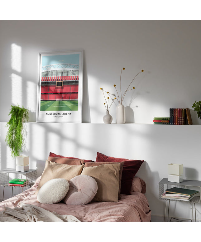 Framed illustrated print of Amsterdam Arena in Holland, home to Ajax and Netherlands, showcasing a minimalist design with vibrant red stands, green football pitch, under a blue sky.