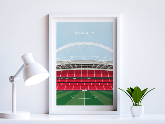 A contemporary style illustration of England's football stadium, Wembley, displayed as an art print within a white frame in a minimalist home office setting. 
