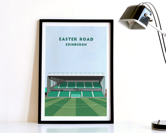 A modern style Hibernian Print, featuring a contemporary illustration of their home stadium the Easter Road in Edinburgh, displayed within a black frame.