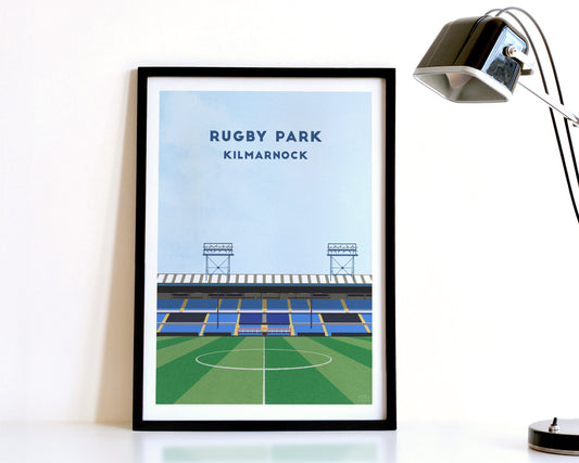 A modern style Kilmarnock Print, featuring a contemporary illustration of their home stadium the Rugby Park in Kilmarnock, displayed within a black frame.
