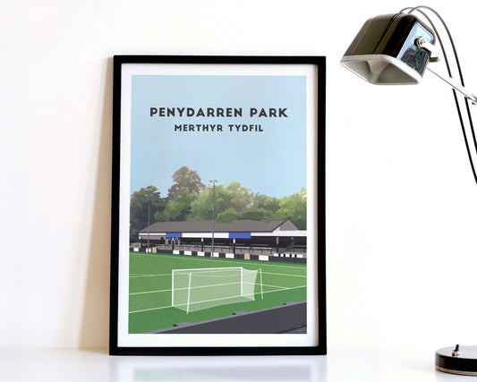 A modern style Merthyr Tydfil Print, featuring a contemporary illustration of their home stadium the Penydarren Park in Merthyr Tydfil, displayed within a black frame.