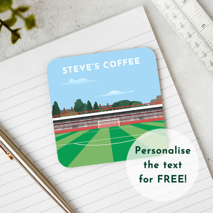 Image showcasing wooden coaster with stadium illustration, with personalised text STEVES COFFEE. Text overlay reads: Personalise the text for FREE!