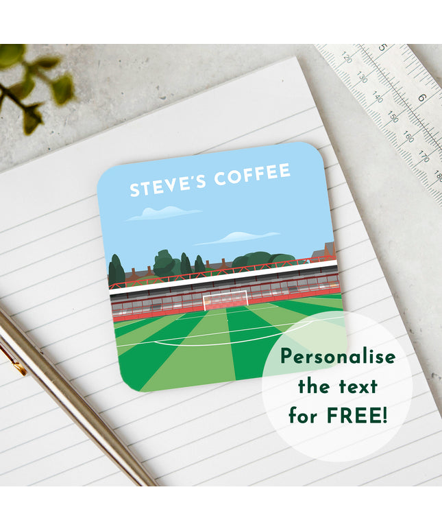 Image showcasing wooden coaster with stadium illustration, with personalised text STEVES COFFEE. Text overlay reads: Personalise the text for FREE!