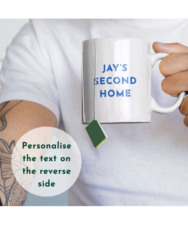 Image showcasing ceramic mug, with personalised text on the reverse JAY’S SECOND HOME. Text overlay reads: Personalise the text on the reverse side