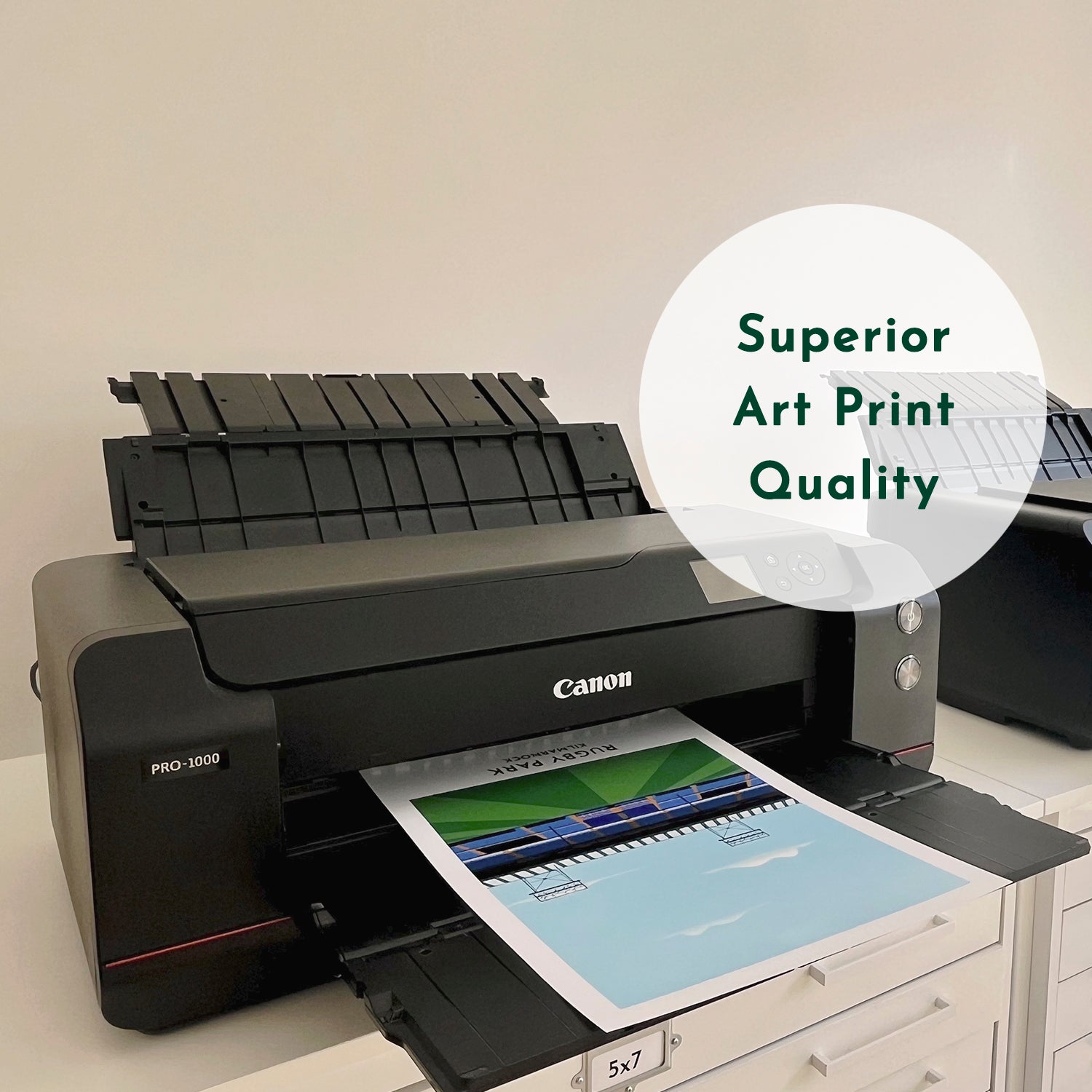 Photo of the Canon professional printers used in Turf Football Art studio to create the prints. Text overlay reads: Superior Art Print Quality