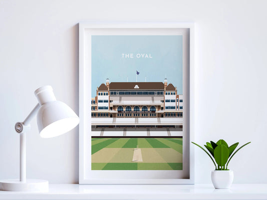 A contemporary style illustration of England and Surrey's cricket stadium, The Oval, displayed as an art print within a white frame in a minimalist home office setting. 