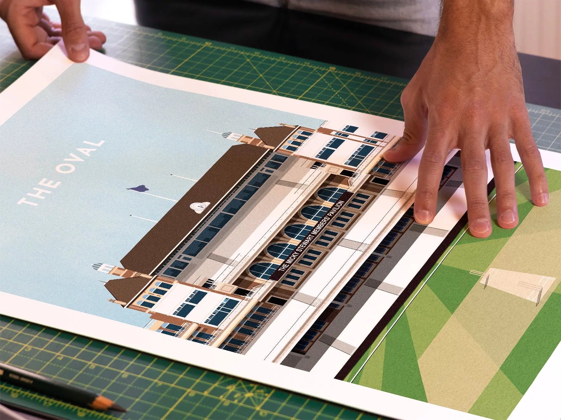 A photo in our printing studio, of one of our illustrated art prints of The Oval after it has been printed and is about to be packaged.
